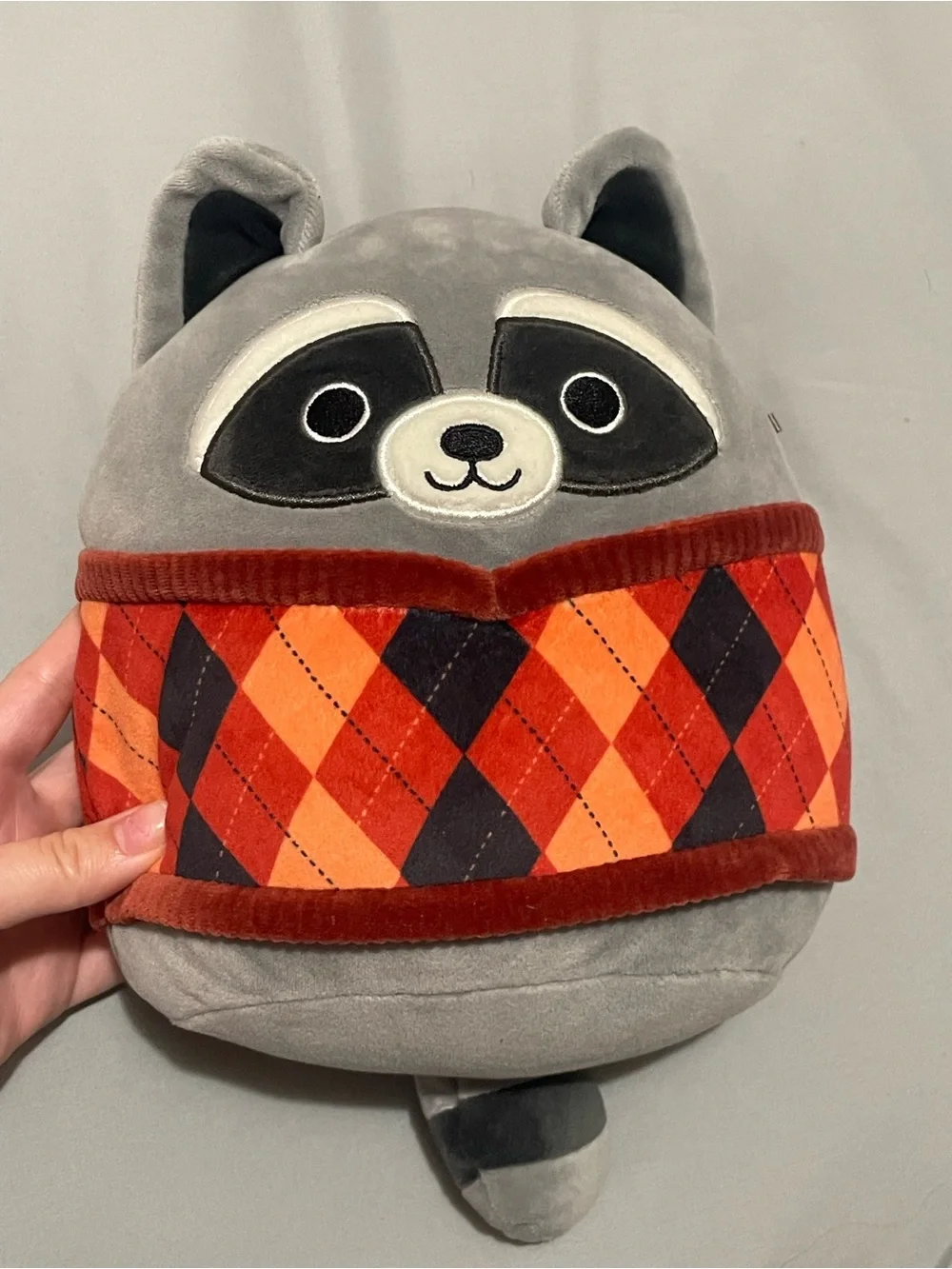 Rocky the Raccoon Plush Kids Accessory with Orange Argyle Scarf